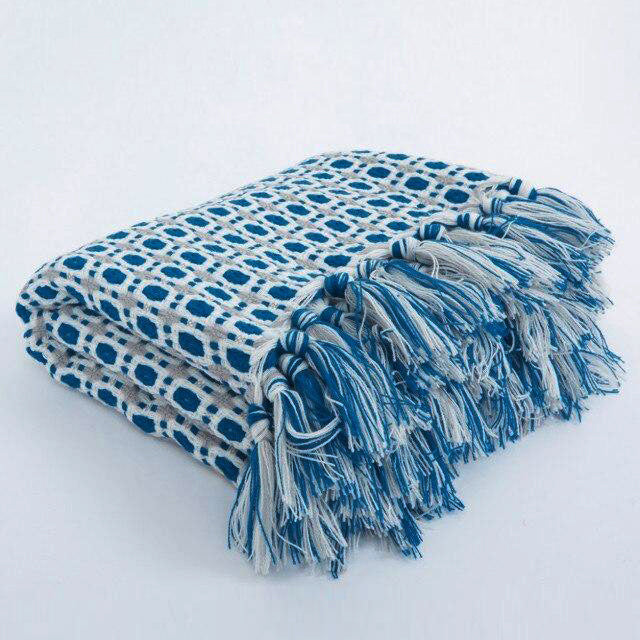 Milano knitted tassel throws