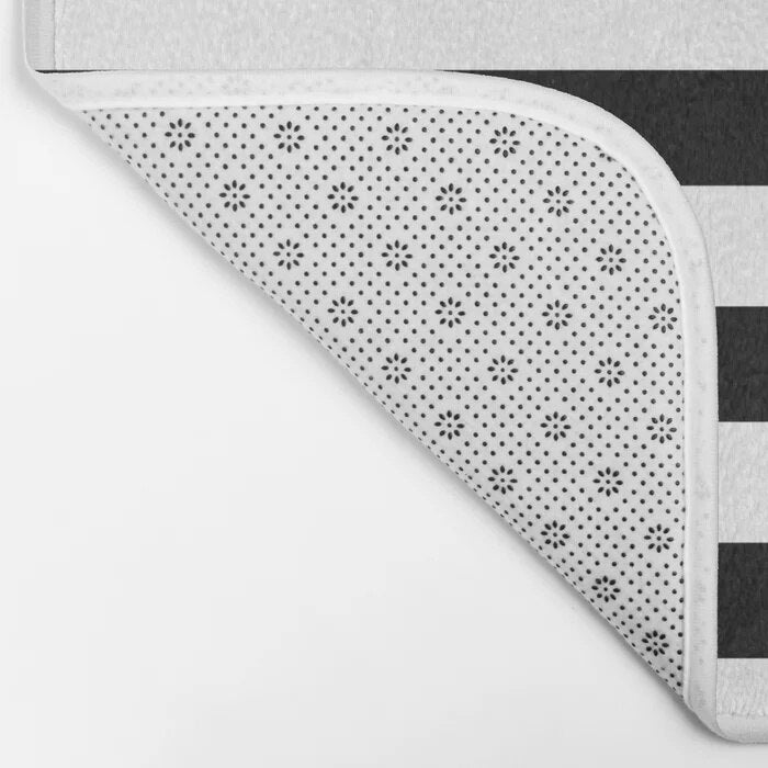 Black and white stripes bath mat