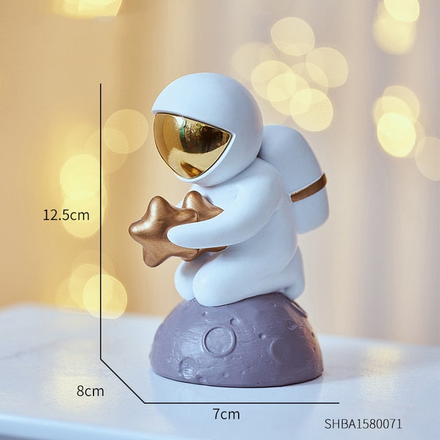 Astronaut Catching Star Figurine