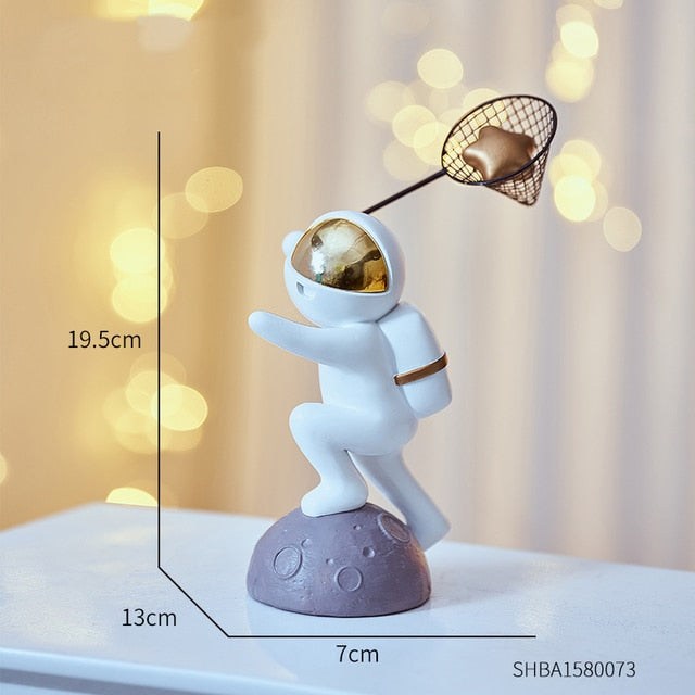 Astronaut Catching Star Figurine